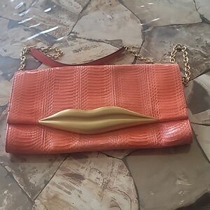 DVF coral snakeskin purse